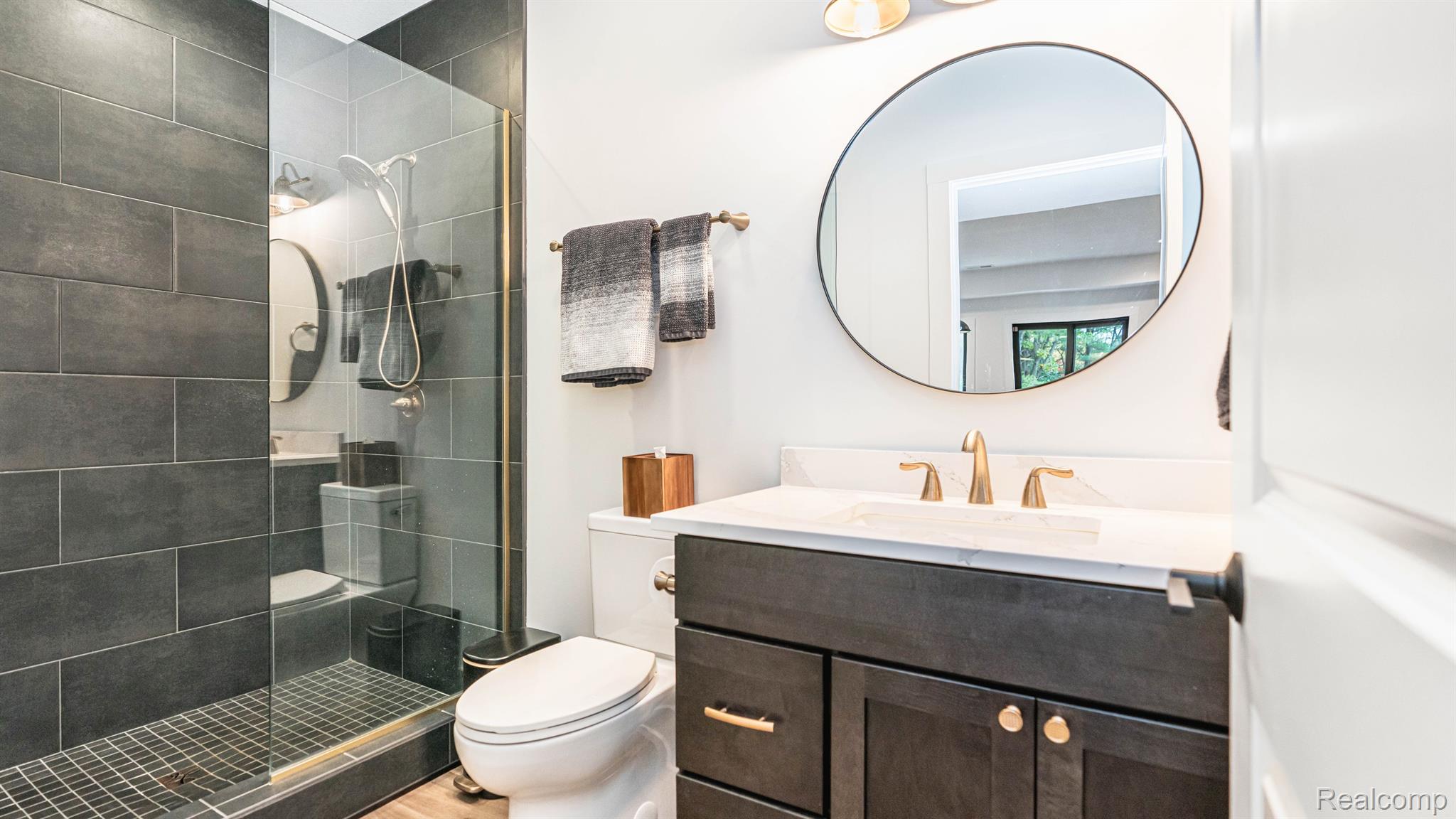 7101 Toma Road Dexter, MI 48130 - Photo 63 of 84 Lower level bathrm w/ floor to ceiling tile shower