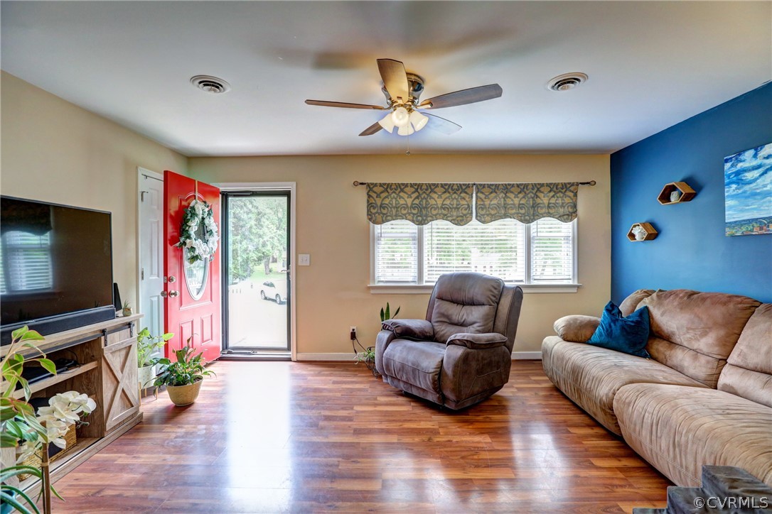 3909 Bronholly Road Chesterfield, VA 23832 - Photo 11 of 38 a living room with furniture and a flat screen tv
