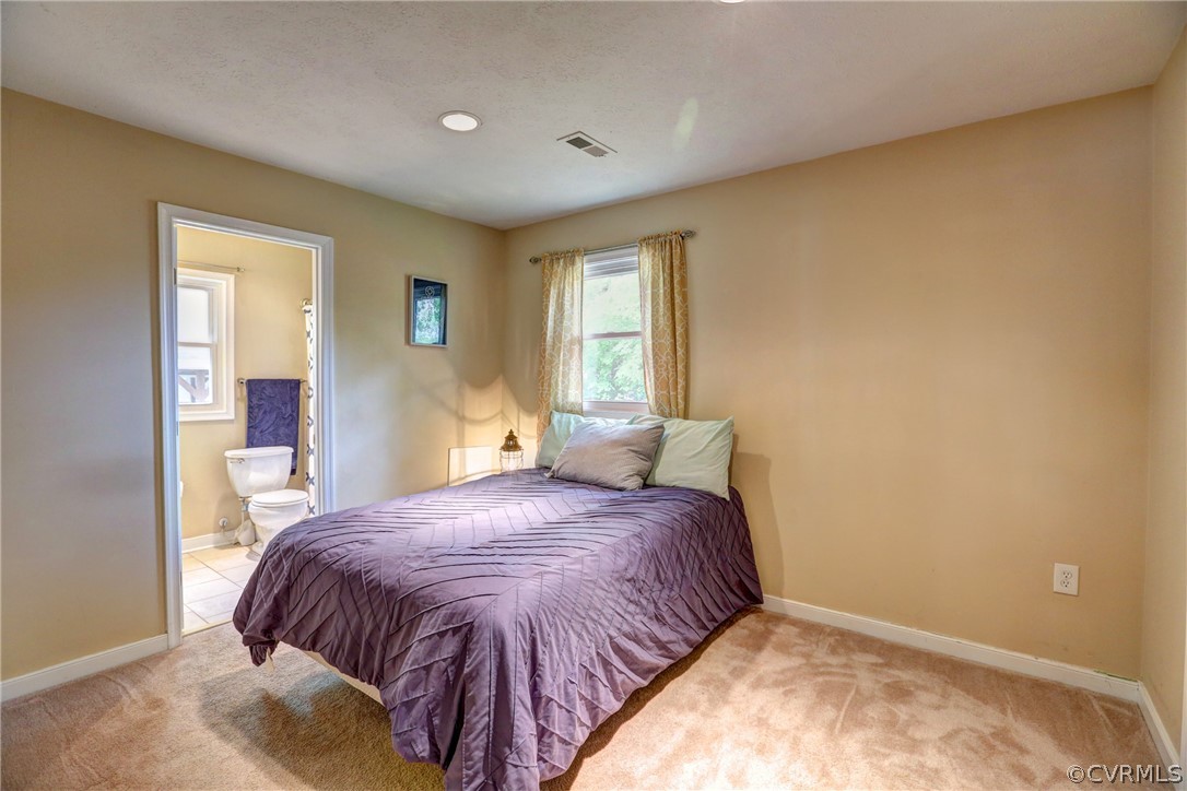 3909 Bronholly Road Chesterfield, VA 23832 - Photo 24 of 38 a bedroom with a bed and a window