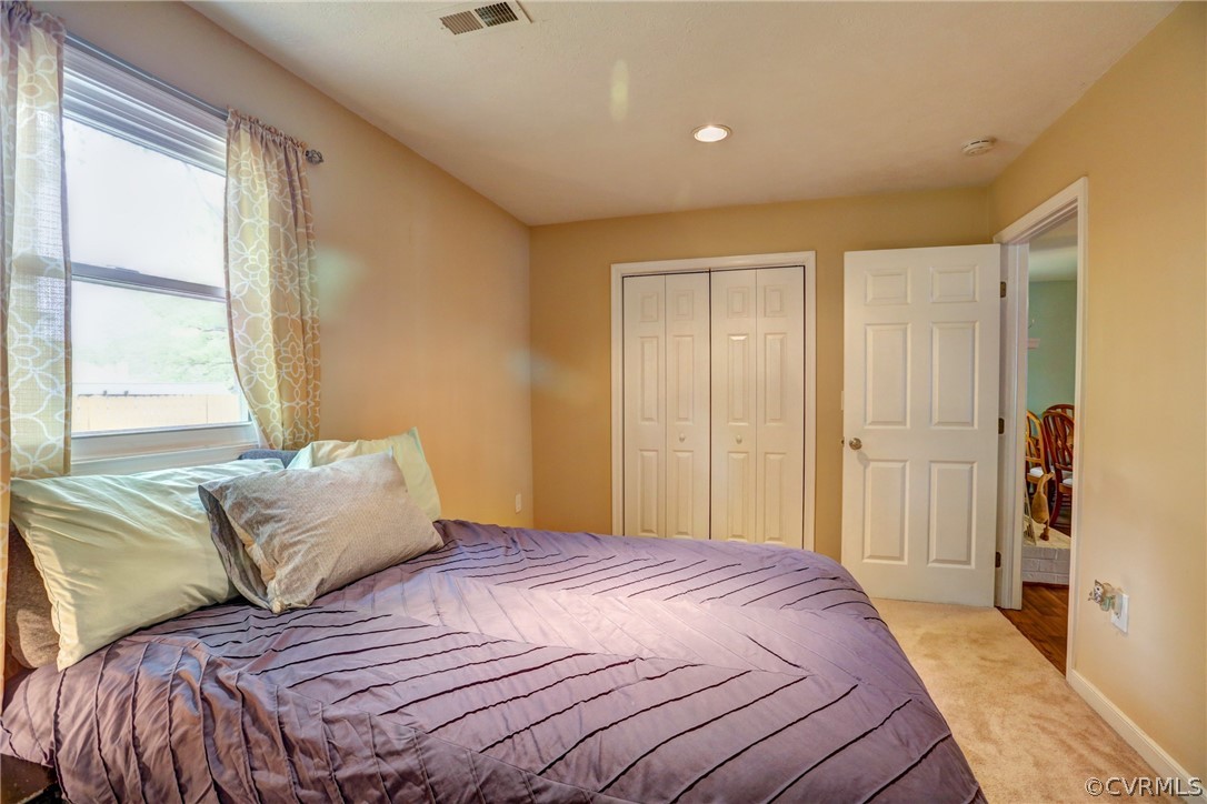 3909 Bronholly Road Chesterfield, VA 23832 - Photo 25 of 38 a bedroom with a bed and a window