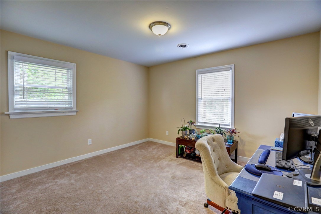 3909 Bronholly Road Chesterfield, VA 23832 - Photo 29 of 38 a view of a workspace with furniture and a window