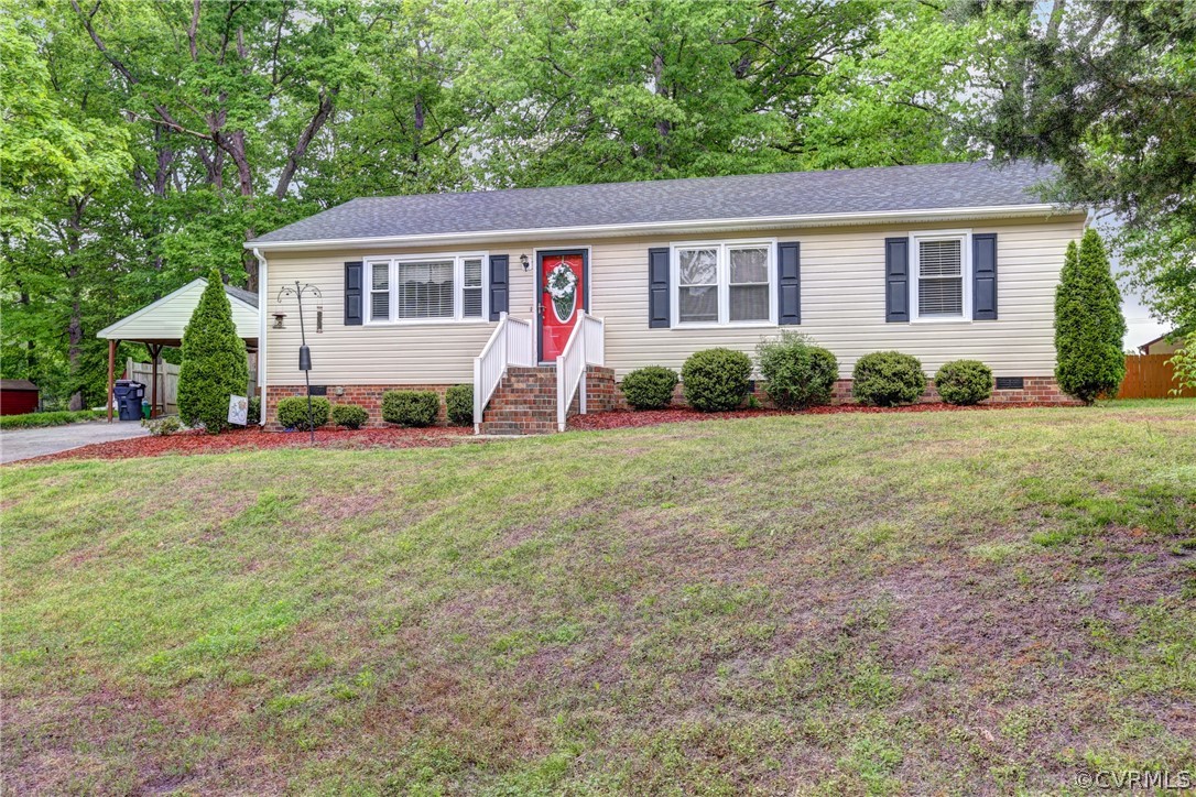 3909 Bronholly Road Chesterfield, VA 23832 - Photo 3 of 38 a view of a house with a yard and plants