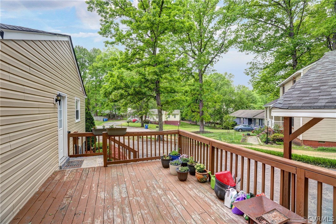 3909 Bronholly Road Chesterfield, VA 23832 - Photo 33 of 38 a view of deck with furniture and trees around