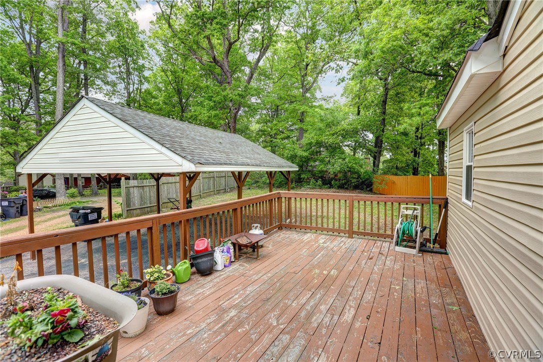 3909 Bronholly Road Chesterfield, VA 23832 - Photo 34 of 38 a view of a wooden deck with a patio