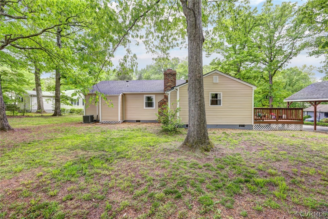 3909 Bronholly Road Chesterfield, VA 23832 - Photo 36 of 38 a view of a yard in front of a house with large trees
