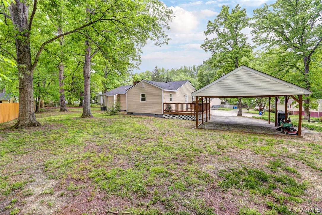 3909 Bronholly Road Chesterfield, VA 23832 - Photo 38 of 38 a backyard of a house with table and chairs