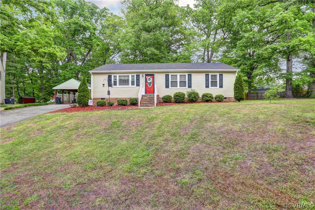 3909 Bronholly Road Chesterfield, VA 23832 - Photo 4 of 38 a view of a house with a big yard and large trees