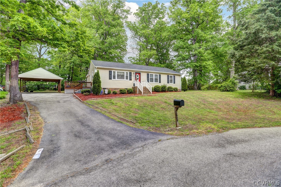 3909 Bronholly Road Chesterfield, VA 23832 - Photo 5 of 38 a house with trees in the background
