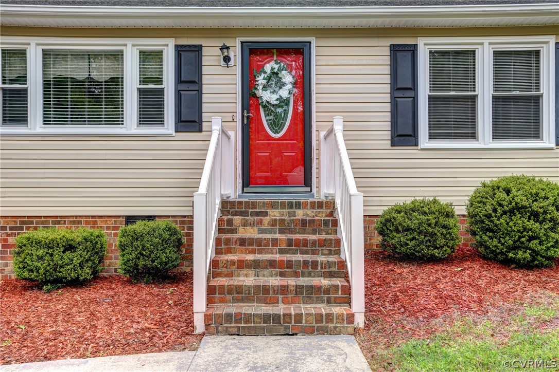 3909 Bronholly Road Chesterfield, VA 23832 - Photo 6 of 38 a front view of a house with garden