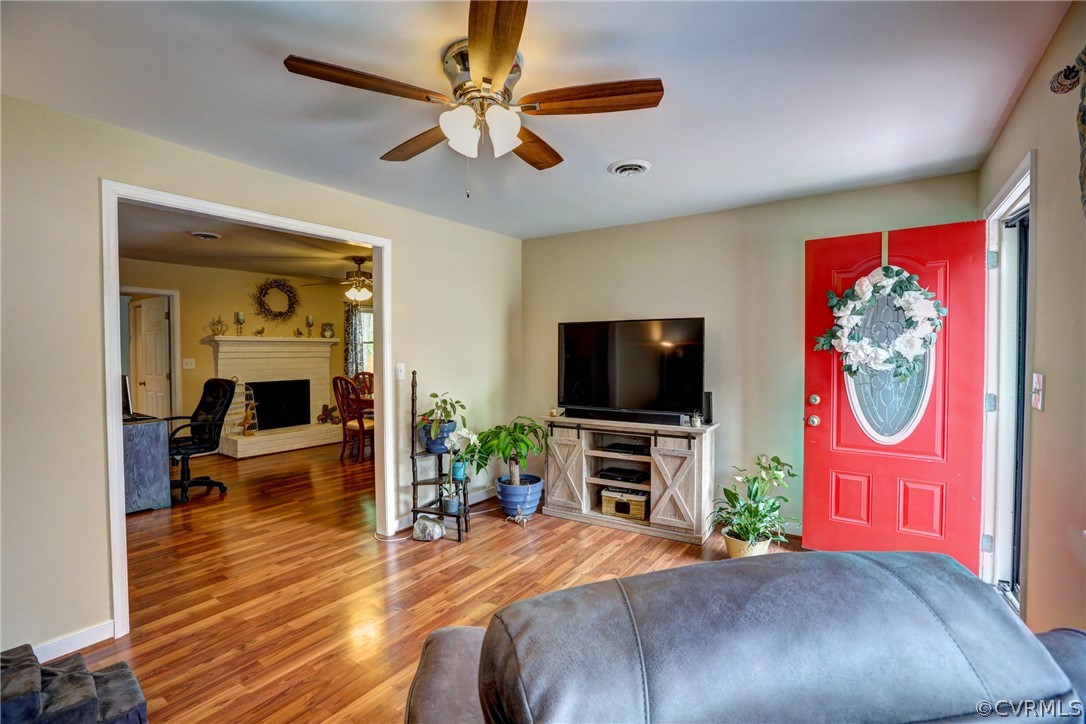 3909 Bronholly Road Chesterfield, VA 23832 - Photo 8 of 38 a bedroom with furniture and a flat screen tv