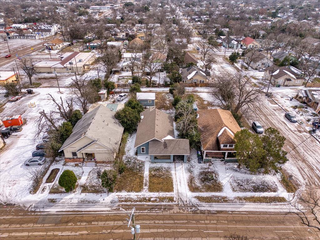 1822 Herring Avenue Waco, TX 76708 - Photo 22 of 26 an aerial view of residential houses with outdoor space and parking