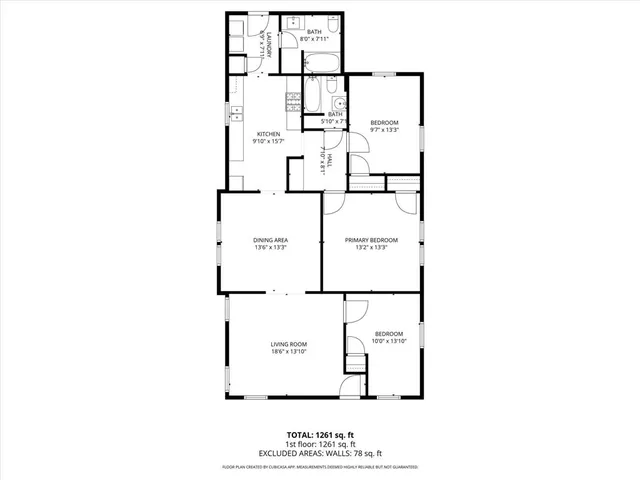 a picture of a bench in front of a wall