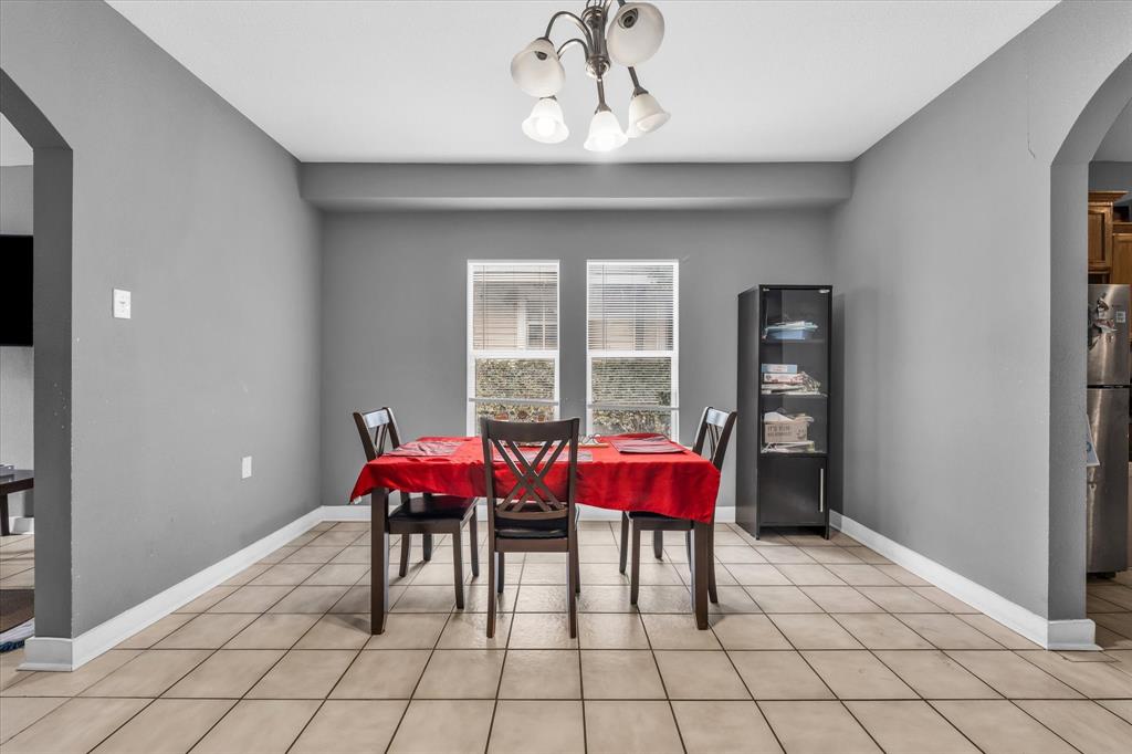 1822 Herring Avenue Waco, TX 76708 - Photo 6 of 26 a view of a dining room with furniture window and outside view