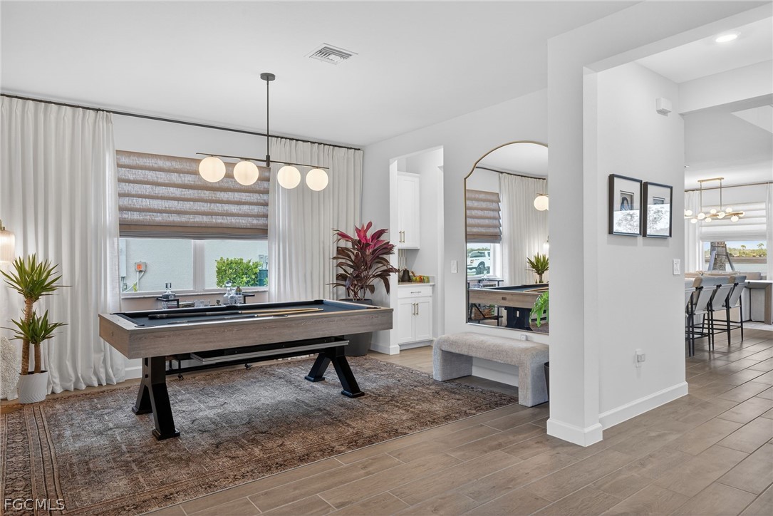 14598 Lagoon Drive Punta Gorda, FL 33982 - Photo 13 of 46 a view of a livingroom with furniture and window