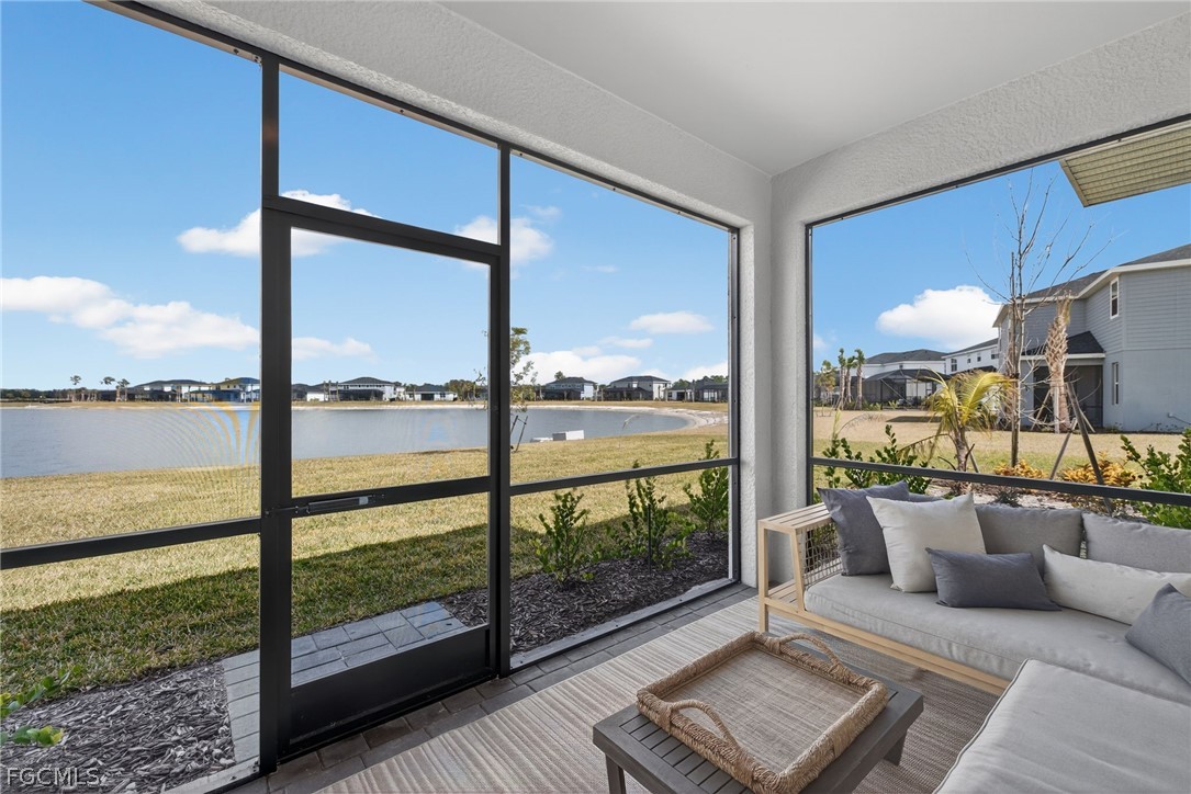 14598 Lagoon Drive Punta Gorda, FL 33982 - Photo 18 of 46 a view of a living room with a floor to ceiling window and an floor to ceiling window