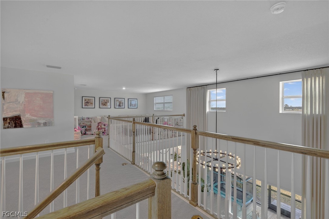 14598 Lagoon Drive Punta Gorda, FL 33982 - Photo 19 of 46 a view of a hallway with windows