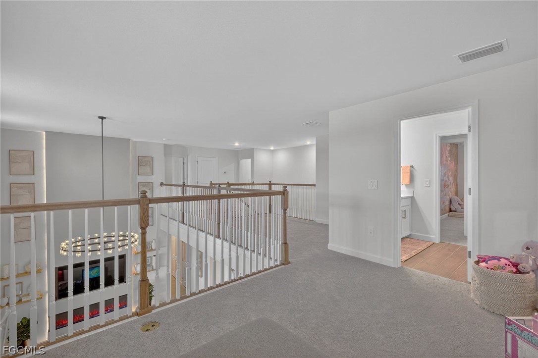 14598 Lagoon Drive Punta Gorda, FL 33982 - Photo 20 of 46 a view of livingroom with stairs