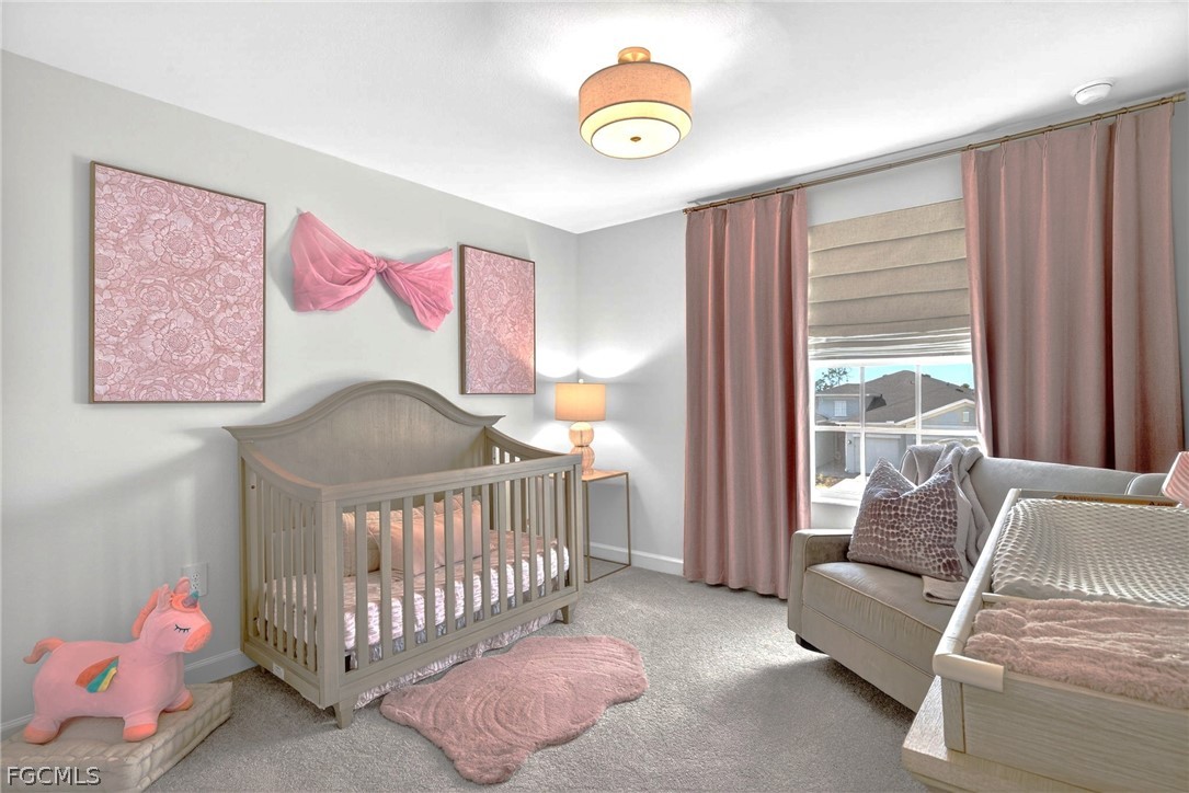 14598 Lagoon Drive Punta Gorda, FL 33982 - Photo 32 of 46 a bedroom with furniture and a window