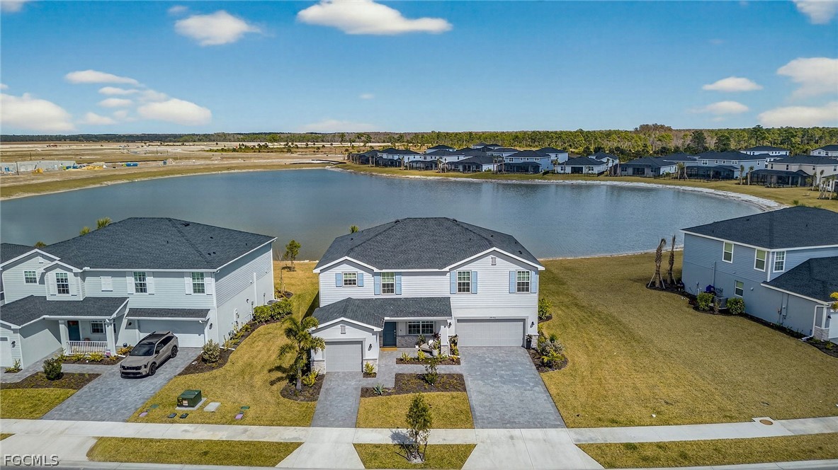 14598 Lagoon Drive Punta Gorda, FL 33982 - Photo 38 of 46 a view of a swimming pool with a table and chairs