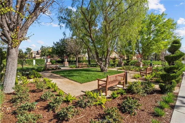 a view of a garden with patio