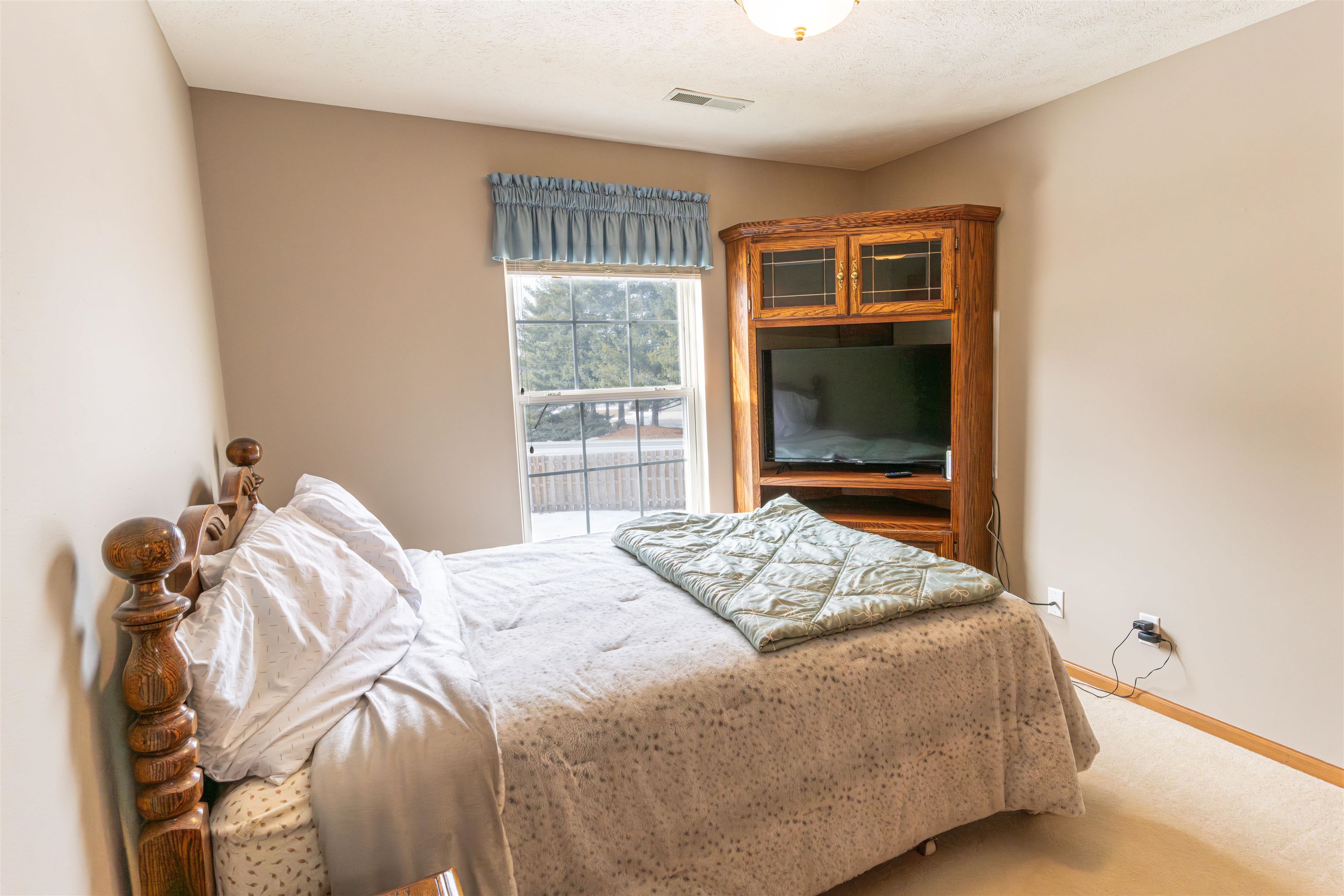 6502 Timberleaf Court Loves Park, IL 61111 - Photo 15 of 23 a bedroom with a bed and a window