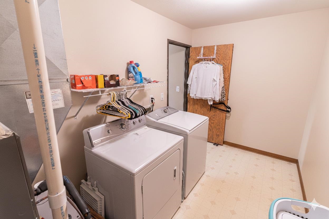 6502 Timberleaf Court Loves Park, IL 61111 - Photo 21 of 23 a utility room with dryer and washer