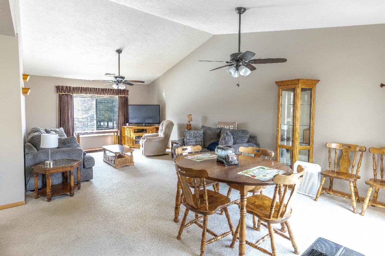 6502 Timberleaf Court Loves Park, IL 61111 - Photo 6 of 23 a view of a dining room with furniture wooden floor and chandelier
