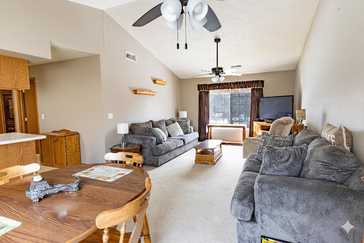 6502 Timberleaf Court Loves Park, IL 61111 - Photo 9 of 23 a living room with furniture fireplace and a chandelier
