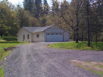 22613 East Side Road Willits, CA 95490 - Photo 2 of 9 a view of a house with a yard and large tree