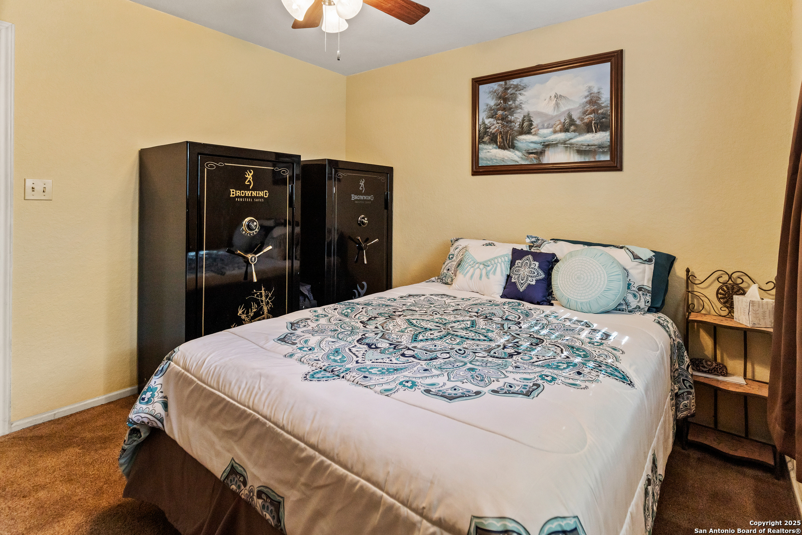 606 Ingram Road Devine, TX 78016 - Photo 15 of 36 a bedroom with a bed and a dresser