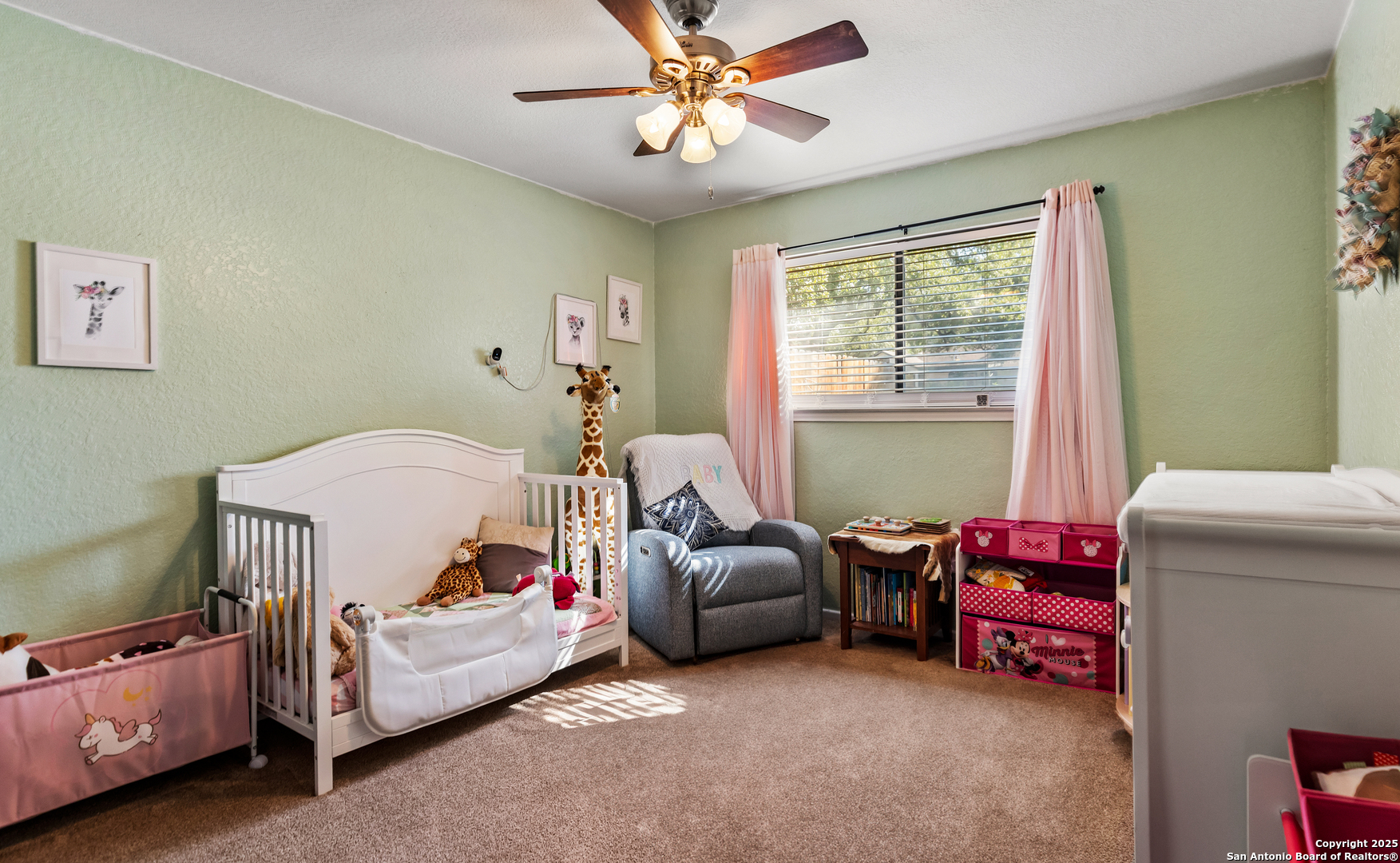 606 Ingram Road Devine, TX 78016 - Photo 17 of 36 a living room with a couch and a window