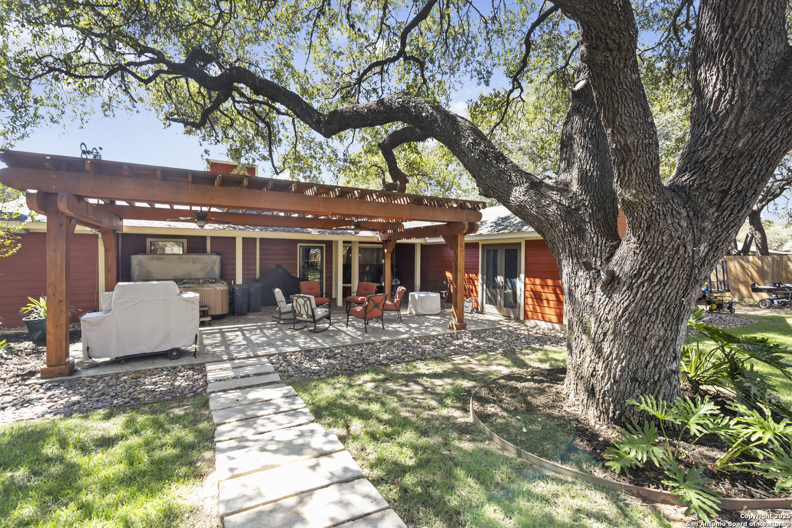 606 Ingram Road Devine, TX 78016 - Photo 31 of 36 a view of a house with backyard