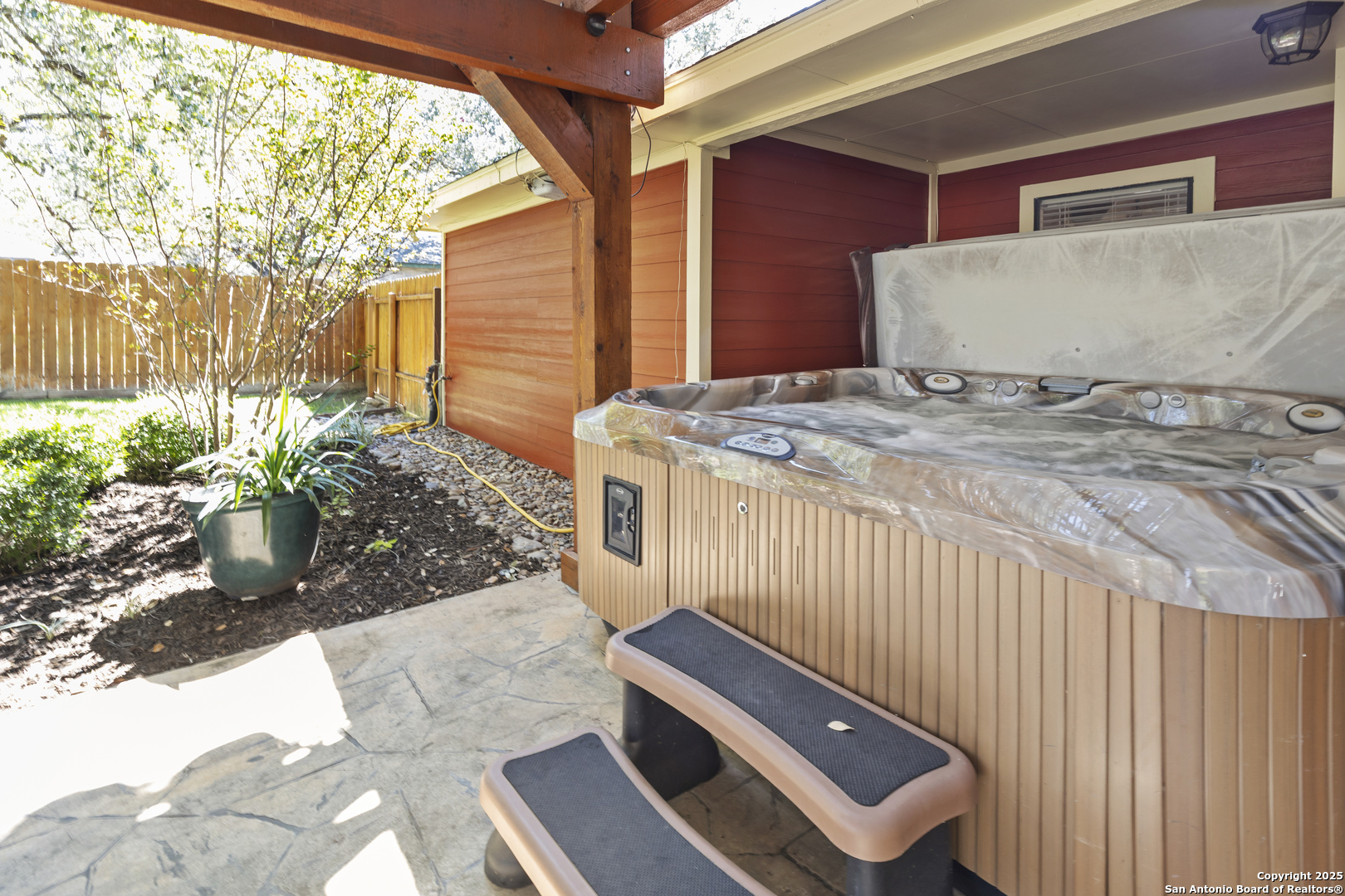606 Ingram Road Devine, TX 78016 - Photo 32 of 36 a view of a backyard with sitting area