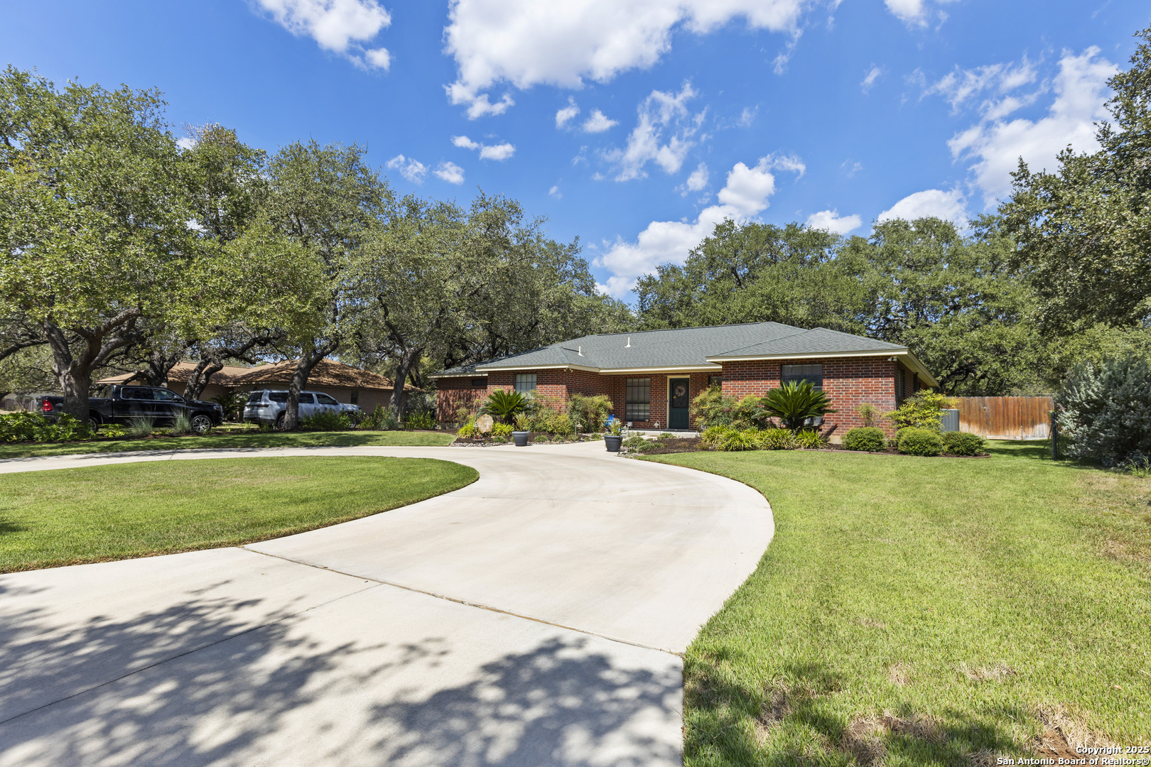 606 Ingram Road Devine, TX 78016 - Photo 36 of 36 a view of a house with a yard