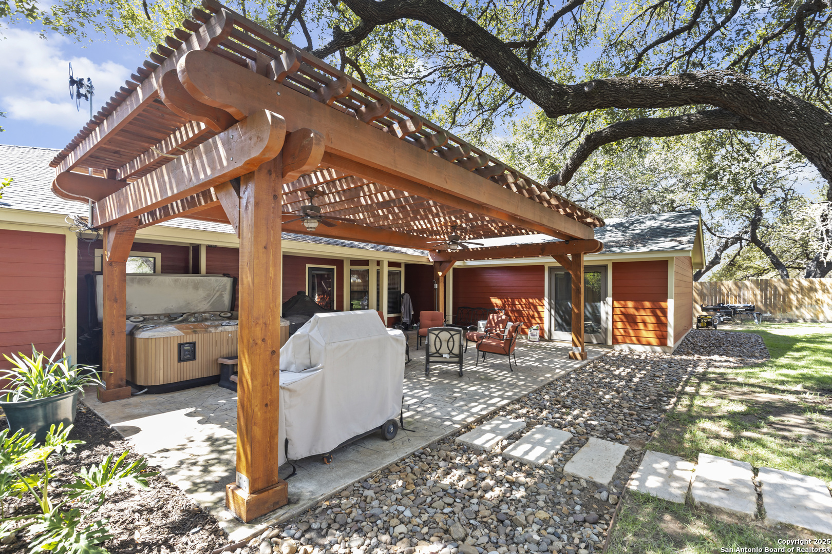 606 Ingram Road Devine, TX 78016 - Photo 4 of 36 a front view of a house with patio