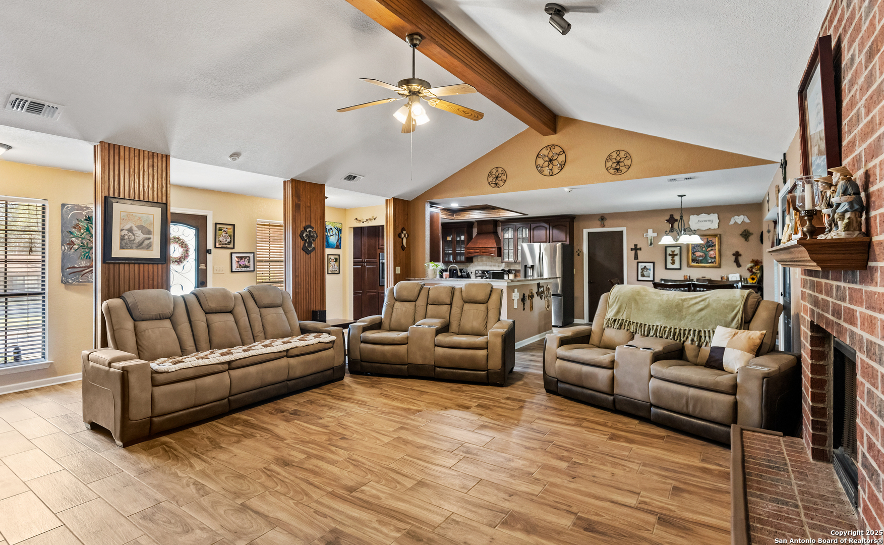 606 Ingram Road Devine, TX 78016 - Photo 6 of 36 a living room with furniture kitchen view and a large window