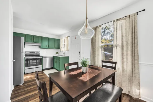 a bedroom with a bed and a chair