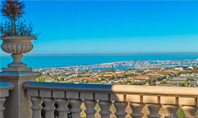 a view of a balcony with an ocean view