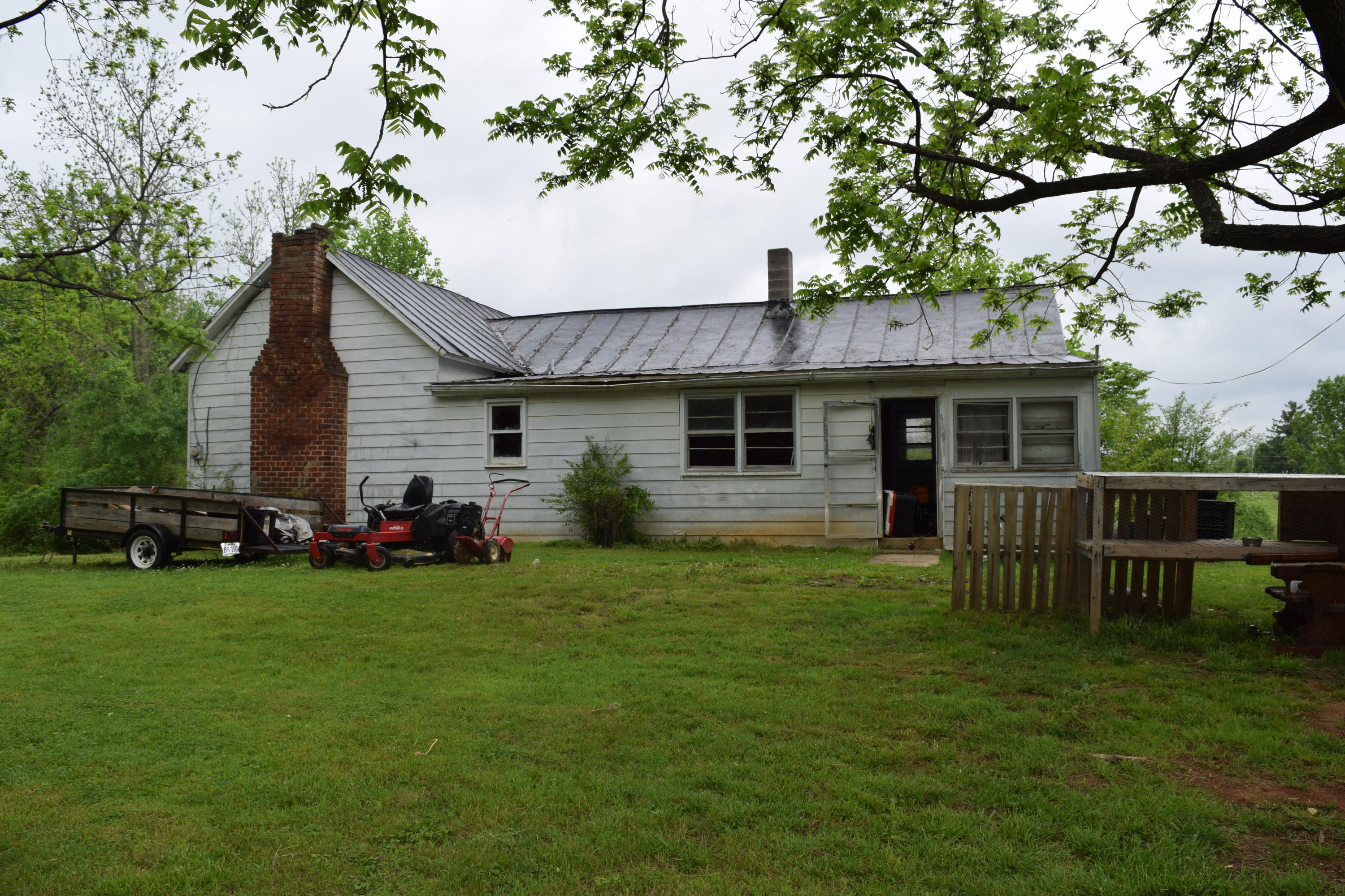 4752 Waidsboro Road Ferrum, VA 24088 - Photo 12 of 38 a view of a house with a yard and sitting area