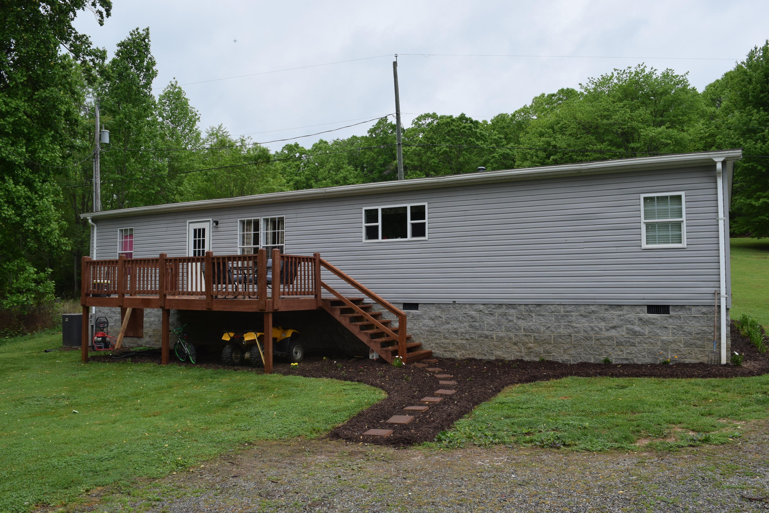 4752 Waidsboro Road Ferrum, VA 24088 - Photo 14 of 38 a view of a house with a yard and sitting area