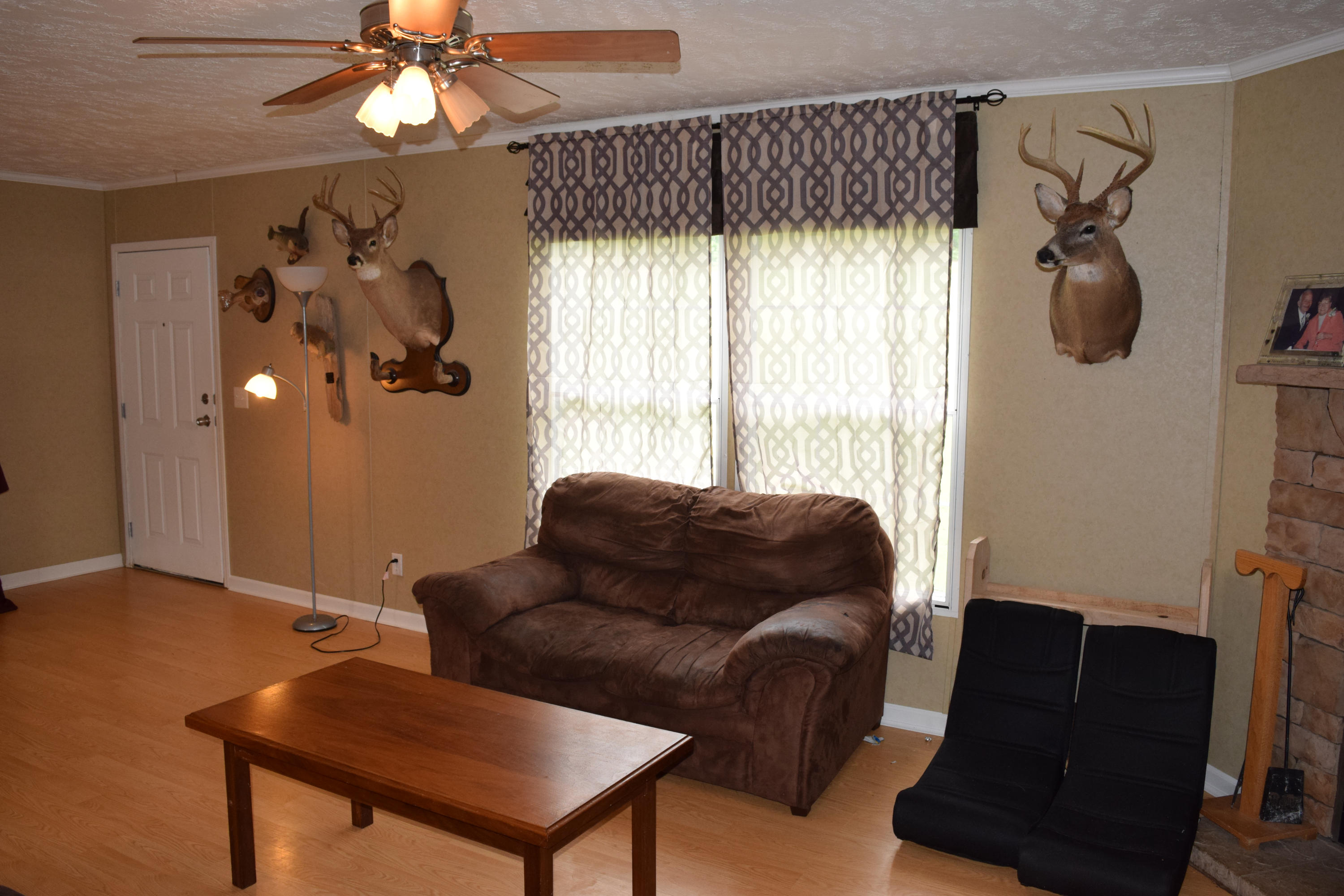 4752 Waidsboro Road Ferrum, VA 24088 - Photo 20 of 38 a living room with furniture and a window