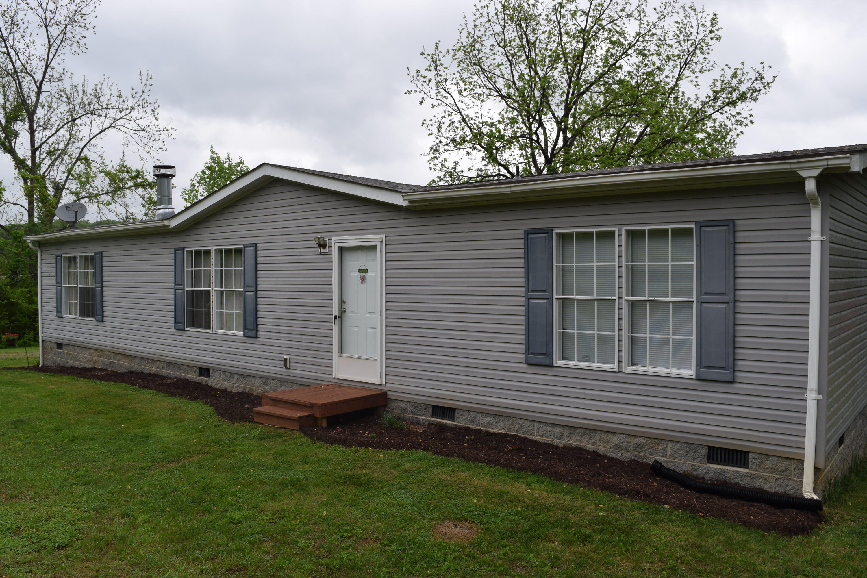 4752 Waidsboro Road Ferrum, VA 24088 - Photo 3 of 38 a view of front of a house with a yard