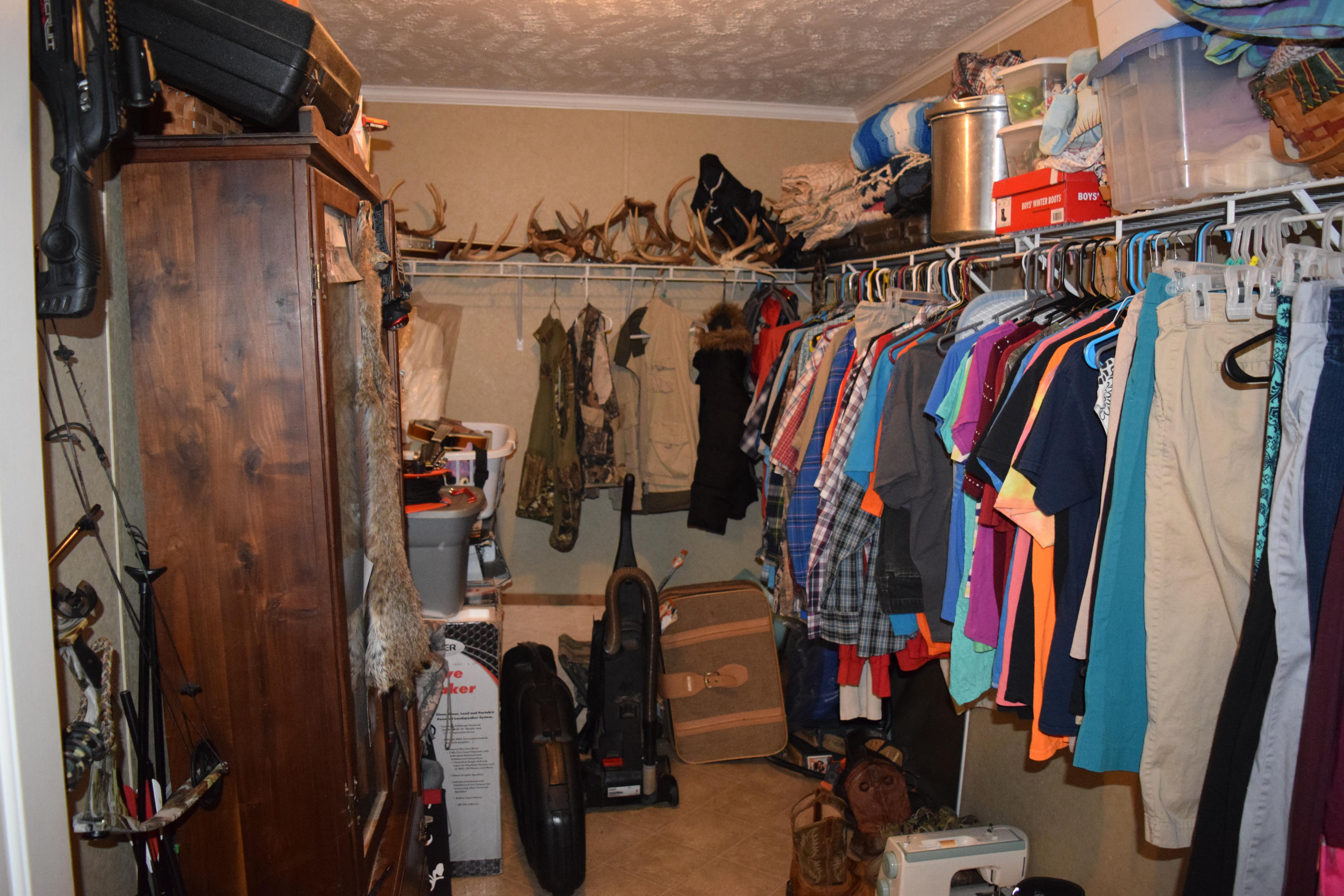 4752 Waidsboro Road Ferrum, VA 24088 - Photo 27 of 38 a view of walk in closet with clothes