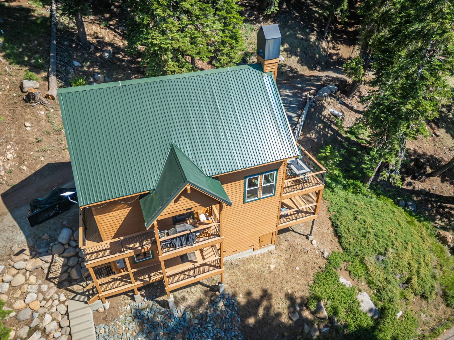 1070 Mountain View Road Arnold, CA 95223 - Photo 13 of 99 an aerial view of a house with a yard and wooden fence