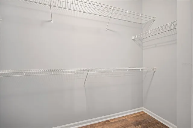 a view of a room with racks on the wall
