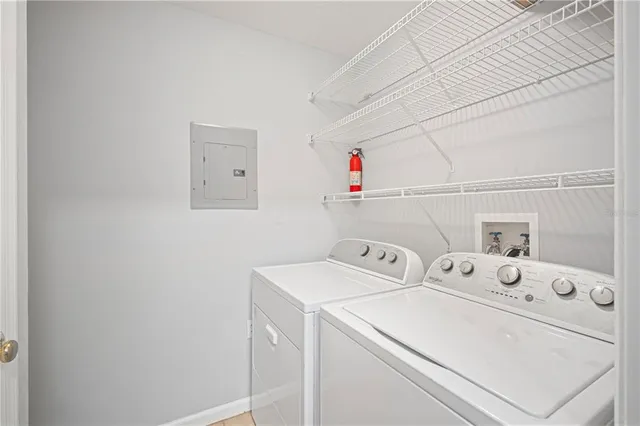 a utility room with dryer and washer