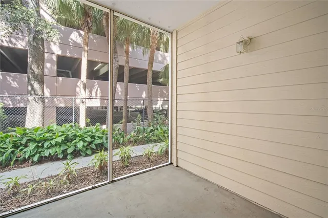 a view of a door and a window
