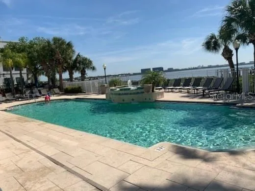 a view of a backyard with sitting area