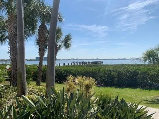 a view of a lake with a garden