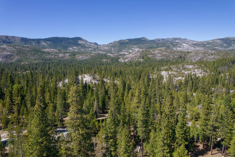 11820 Eagle Lakes Road Nevada City, CA 95959 - Photo 7 of 26 a view of a city with mountains in the background